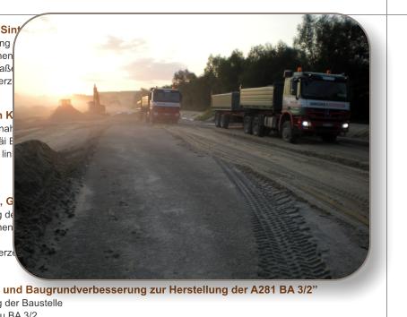 wartende LKW's auf einer Schotterstare